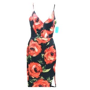 New with tags midi dress low cut with flower detai